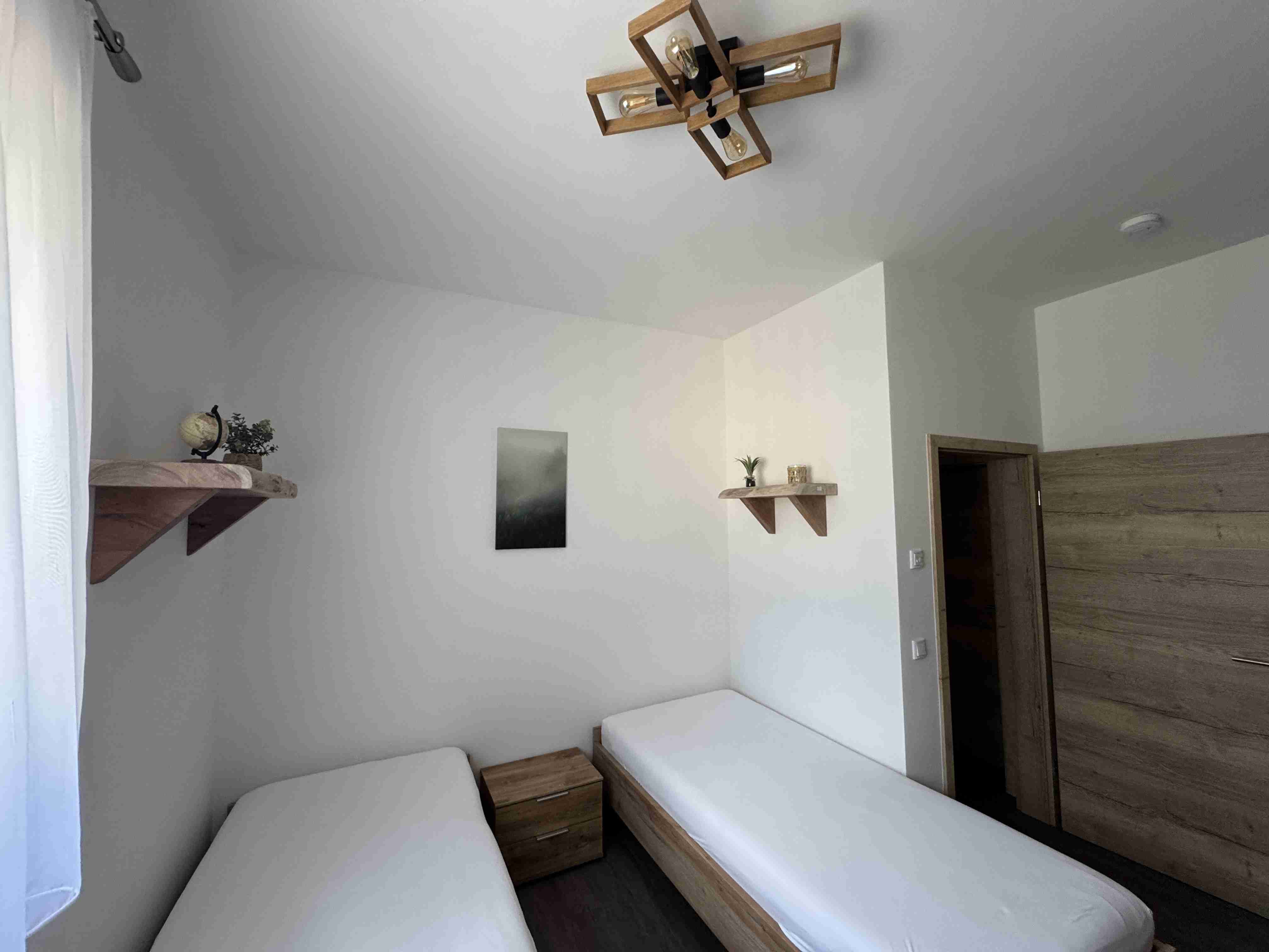 images/ferienhaus_lilienstein/hohe_liebe/schlafzimmer3_01.JPG#joomlaImage://local-images/ferienhaus_lilienstein/hohe_liebe/schlafzimmer3_01.JPG?width=4032&height=3024